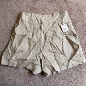 Free People High-Waist Pleated Linen Shorts in Light Beige